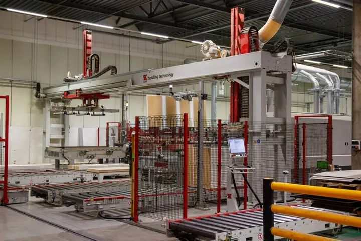 Automated production line with robotic arm in a manufacturing plant
